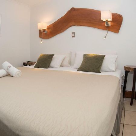 Tupa Boutique Hotel Puerto Iguazu Bagian luar foto